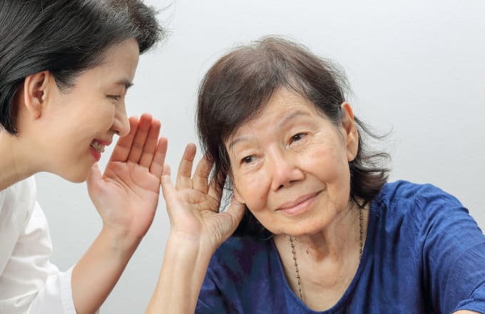 a senior woman hearing in to what a young woman has to say