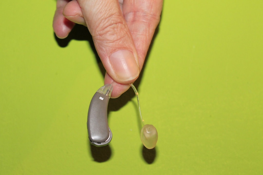 featured image - how to clean hearing aids with 3 simple tips