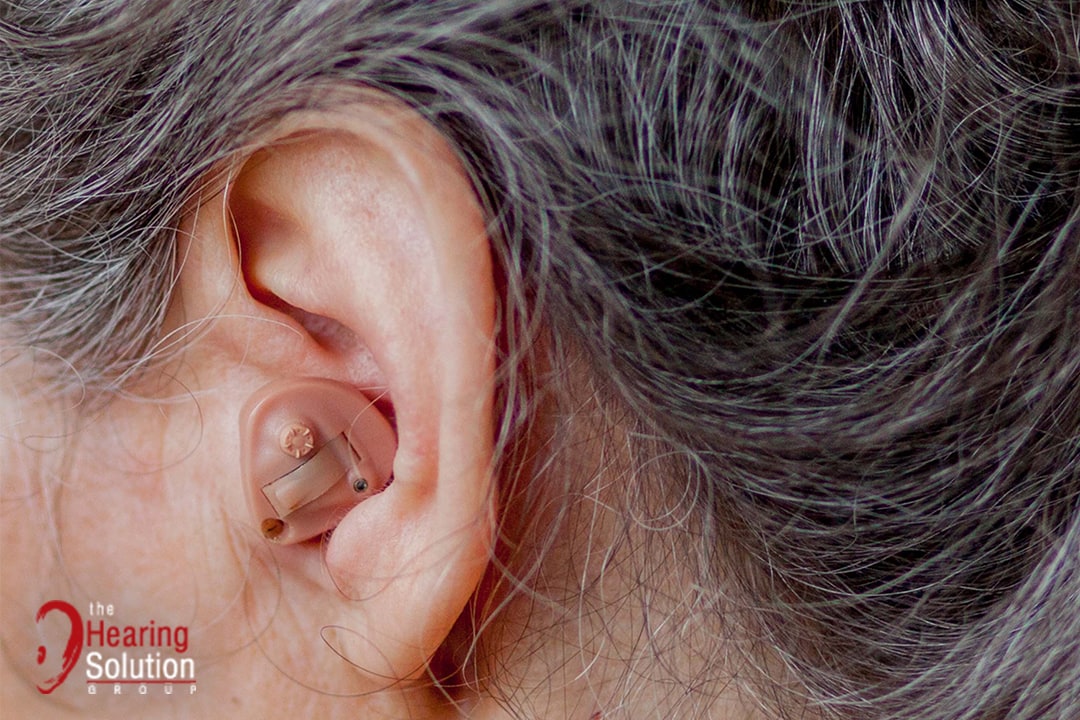 someone wearing hearing aid singapore