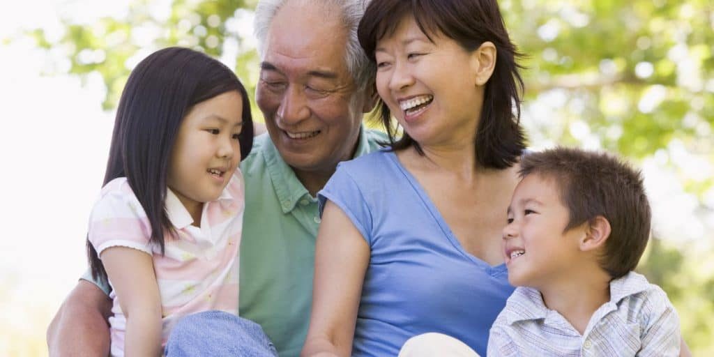 grandparents smiling happily with grandchildren-001